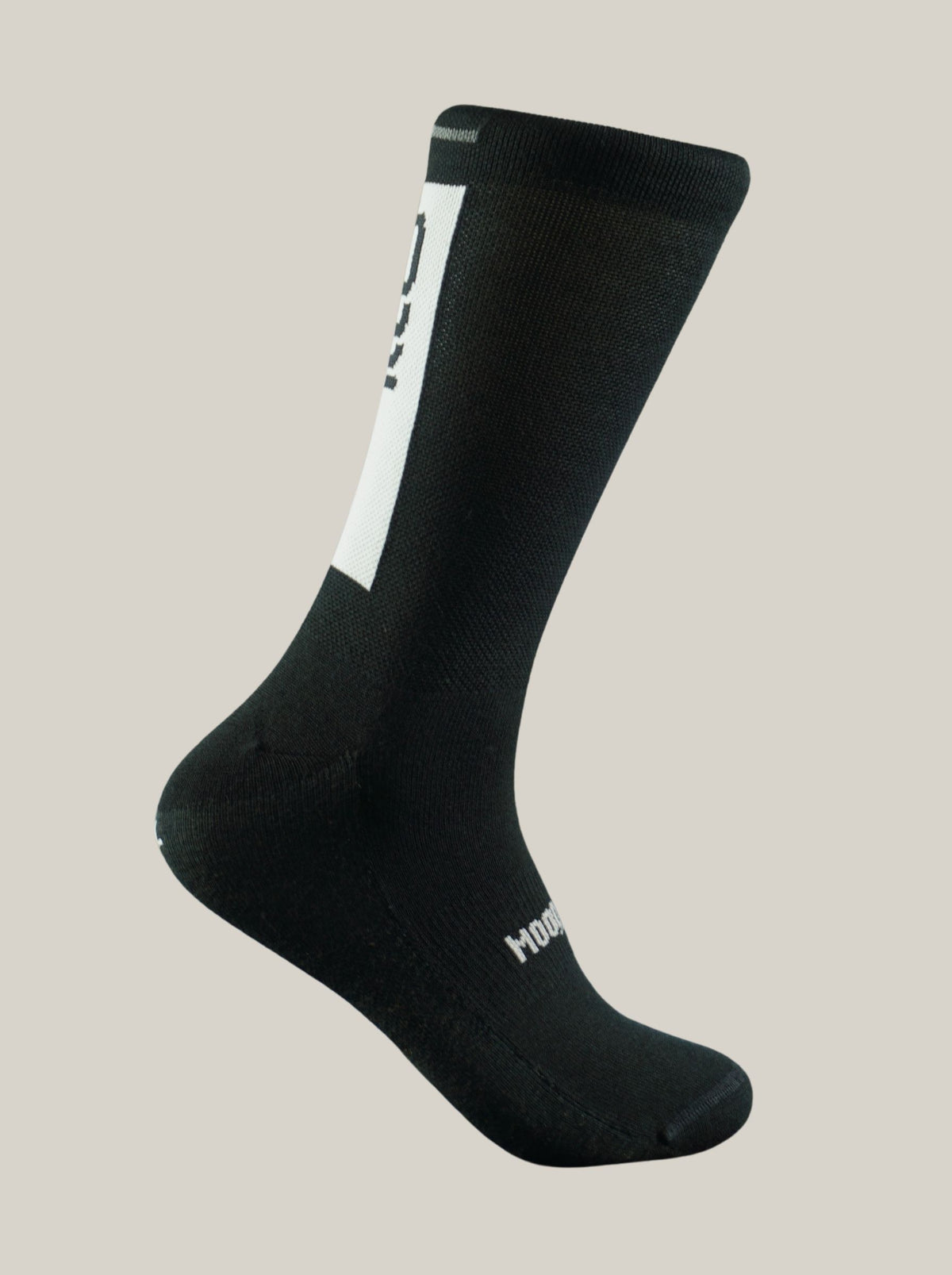 Calcetines de invierno de lana merino Ember en negro vistos desde el perfil interior