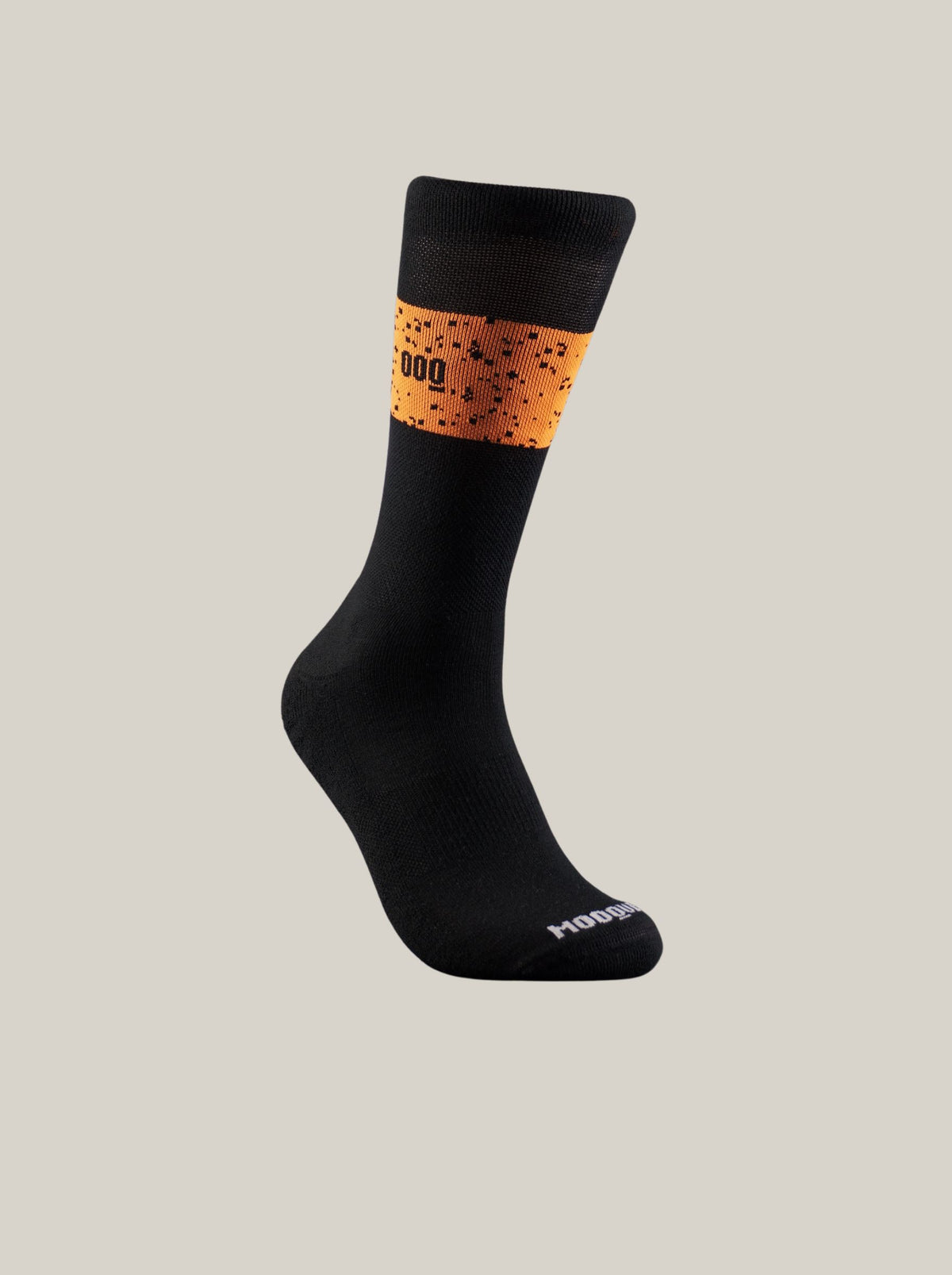 Perfil de los calcetines de ciclismo Beacon Thermique+ en negro y naranja