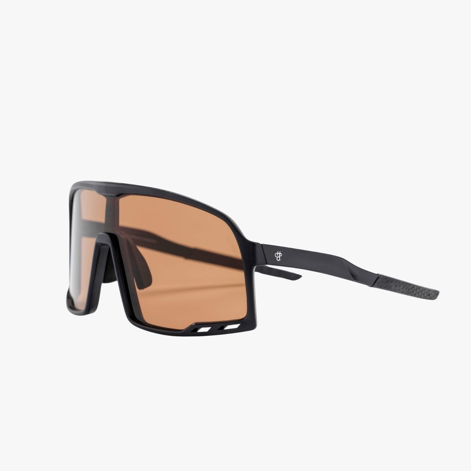 Detalle de la lente amber Cat 2 (23% VLT) en las gafas CHPO Henrik Black Amber para luz media
